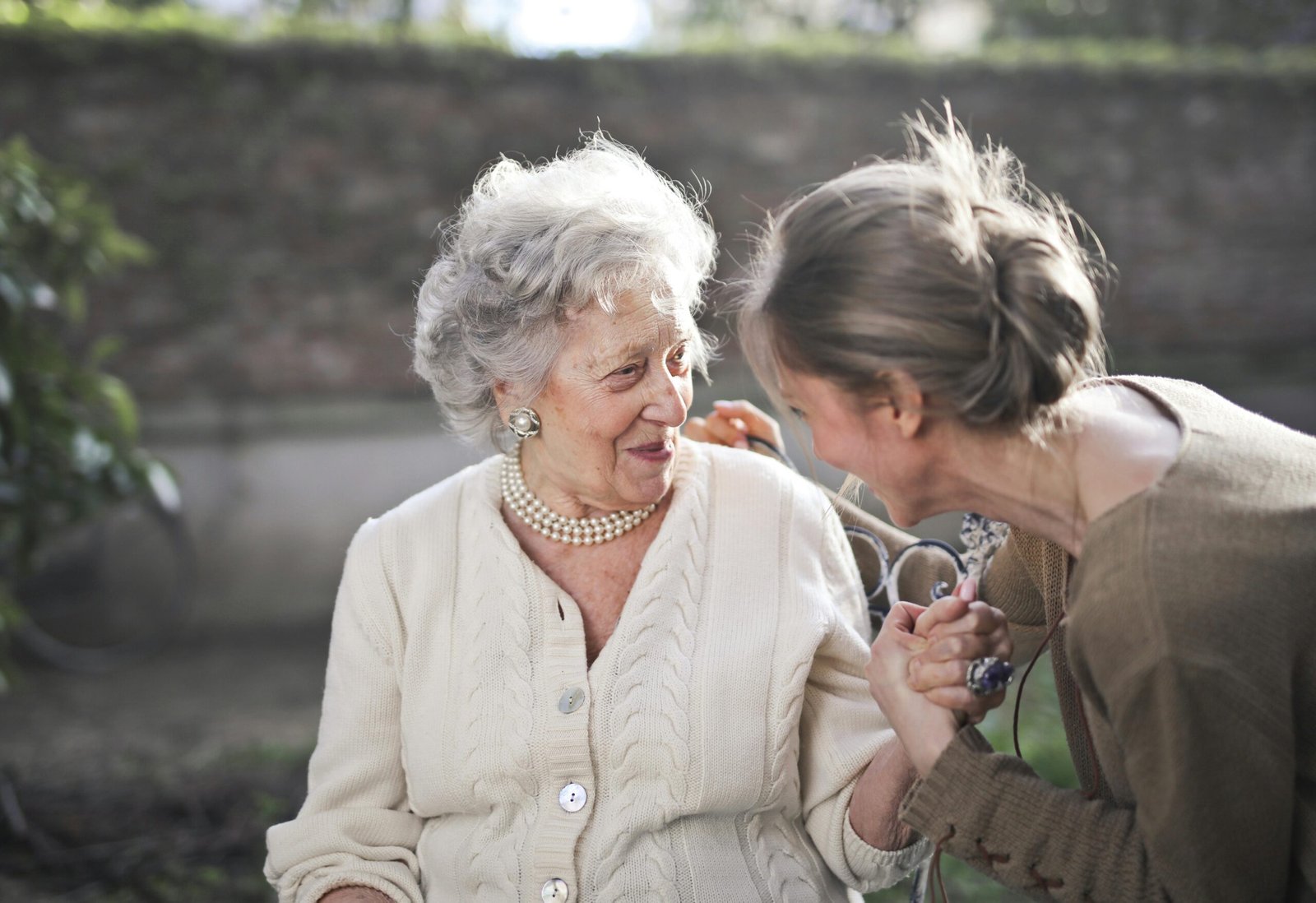 Two women with fine lines and wrinkles