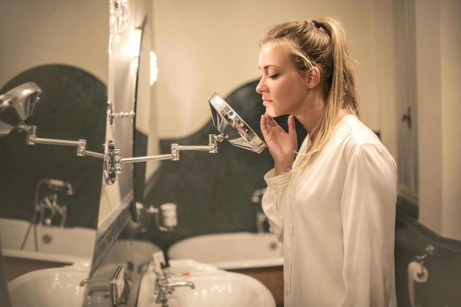 A woman looking at the mirror