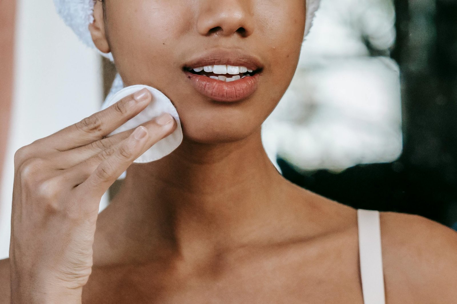 Woman cleaning Her face